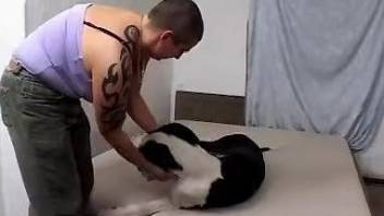 Chubby butch lesbian gets fucked by a kinky dog