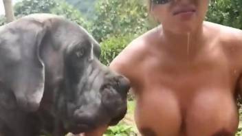 Leather mask babe worships animal cock outdoors